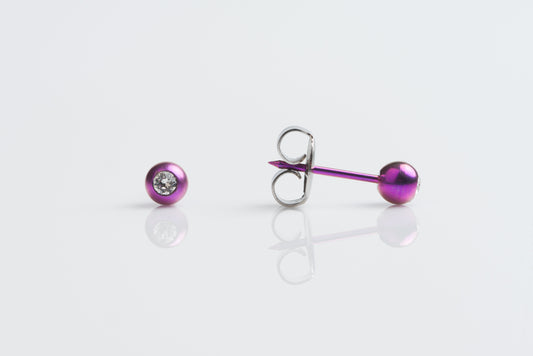 System 75  Birthstone Ball Piercing Studs - 4mm - Clear Crystal - Purple Titanium