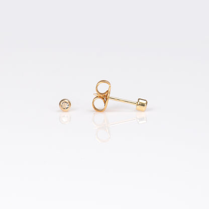 System 75™ Bezel Set Piercing Studs - 2mm - April Clear Crystal - 14K Yellow Gold