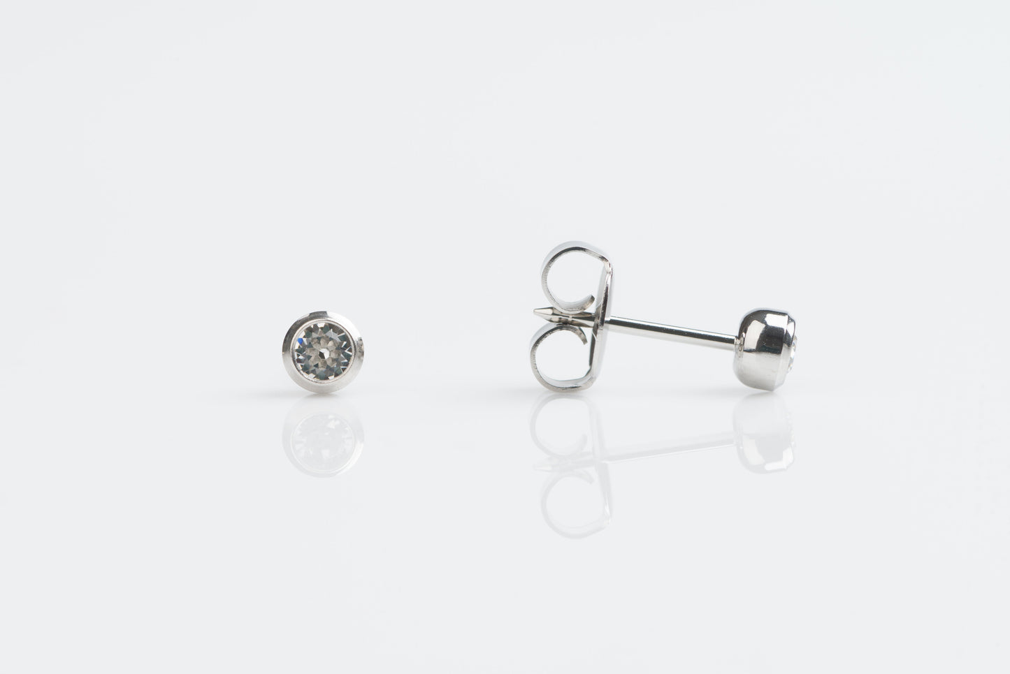 System 75™ Bezel Set Piercing Studs - 3mm - April Clear Crystal - Stainless Steel